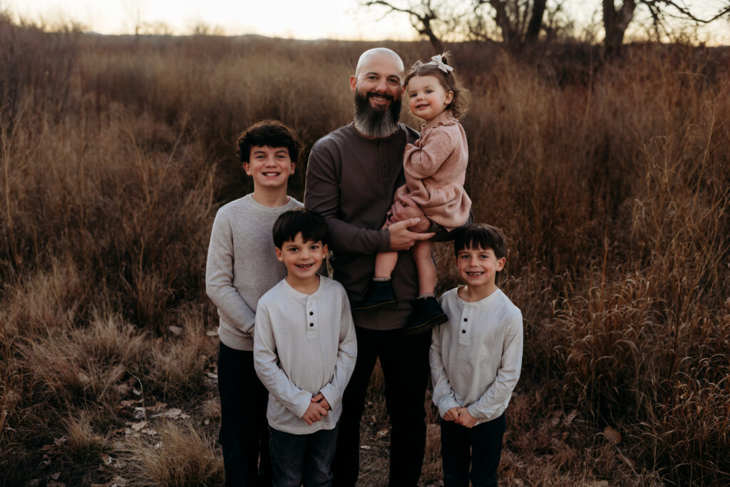 Father and 4 kids by Brighton family photographer