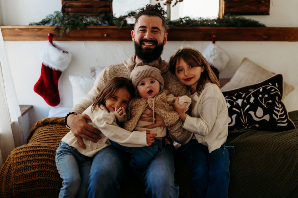 father and daughters Family holiday session in Colorado